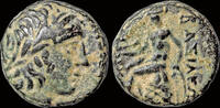 Seleucid Kingdom AE11 Seleucid Kingdom Antiochos III the Great AE11 Apollo seated left on omphalos -