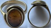 Used large gold ring with amber tested as 14 carat gold -