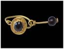 Ancient art Roman bow and shield gold earring with garnets, 2nd.-4th. cent. AD -
