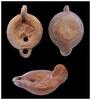 Ancient art Scarce Roman terracotta oil lamp, winged Eros on Dolphin -