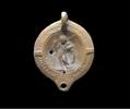 Ancient art Choice Roman terracotta oillamp - Eros holding the arms of Mars! -